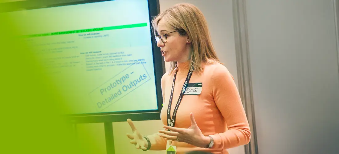 leadership development trainer educating employees at event